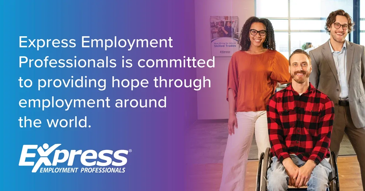 Photo of three adults (two men, one woman) including a man in a wheelchair, all smiling indoors; text: “Express Employment Professionals is committed to providing hope through employment around the world.” and logo “Express Employment Professionals”.