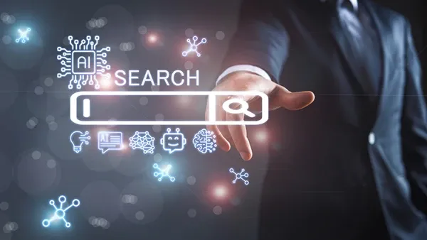 A person in a suit interacts with a virtual search bar surrounded by AI icons on a futuristic dark background.