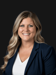 Professional photo of Keri dressed in business professional attire and smiling.