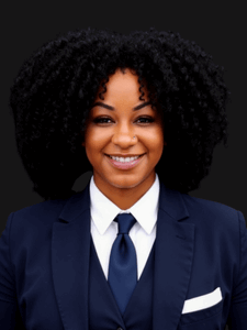 Professional photo of Kristen. She is a young woman with dark hair. She is dressed in business professional clothes. 